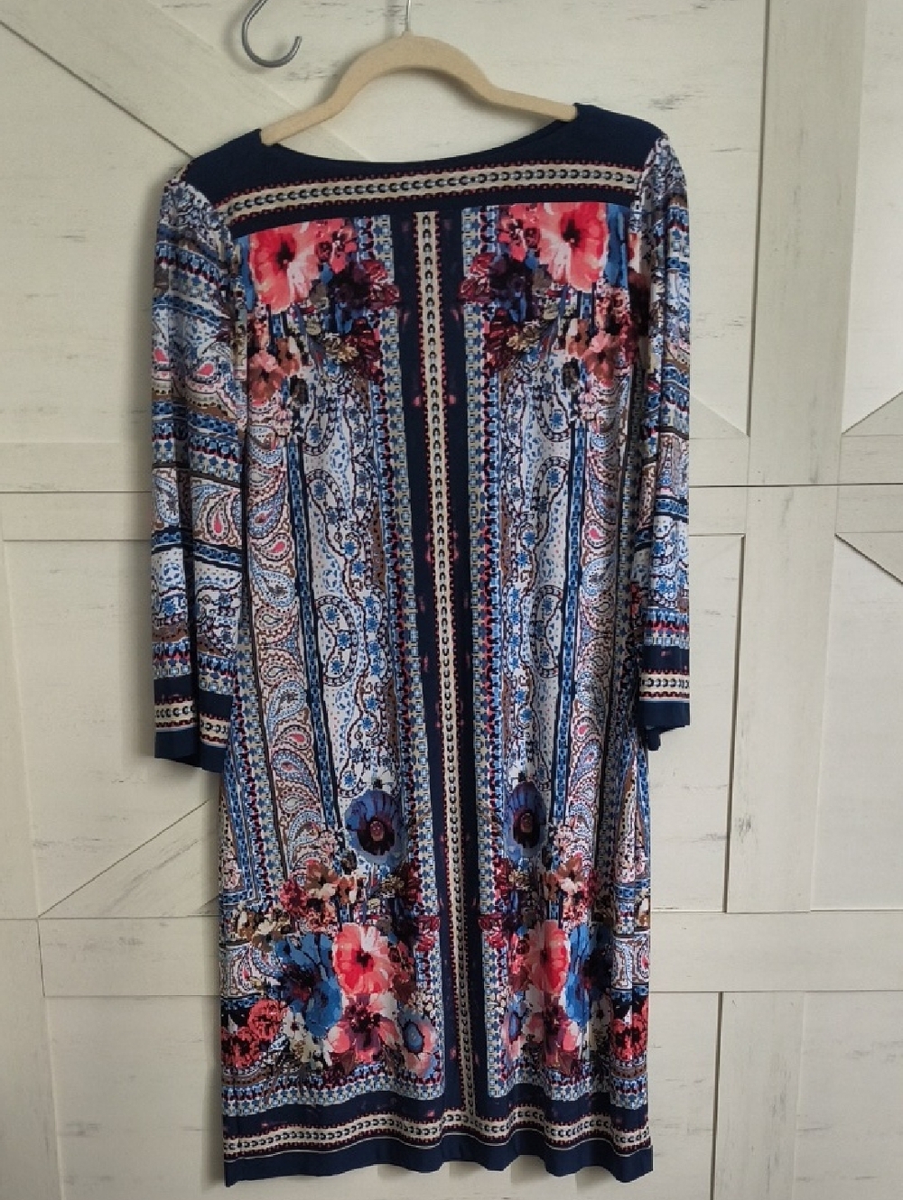 Cute dress. 3/4 Sleeve. Has Some Stretch To Fit Nicely!